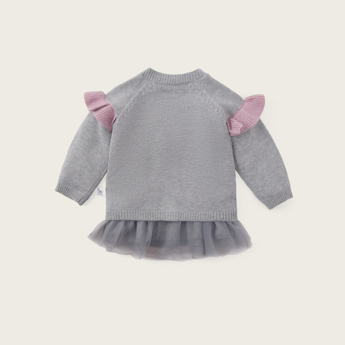 A baby girl's gray knit sweater with pink ruffle shoulder details and a gray tulle tutu hem, shown from the back on a light beige background with 'jacinda bebe' and 'lovely kids' text.